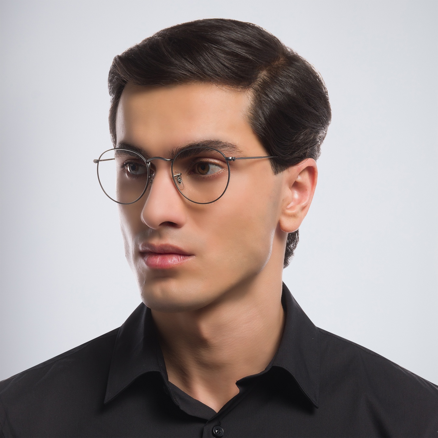 Shop Ray-Ban Round Metal Optics Eyeglasses in Ruthenium online.