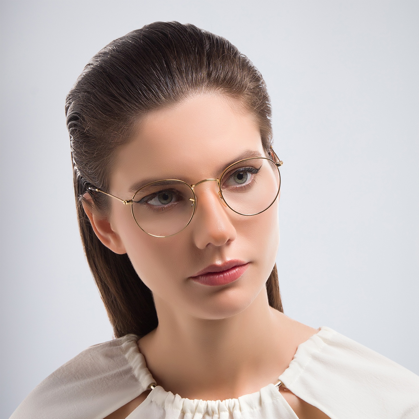 Shop Ray-Ban Round Metal Optics Eyeglasses in Gold online.