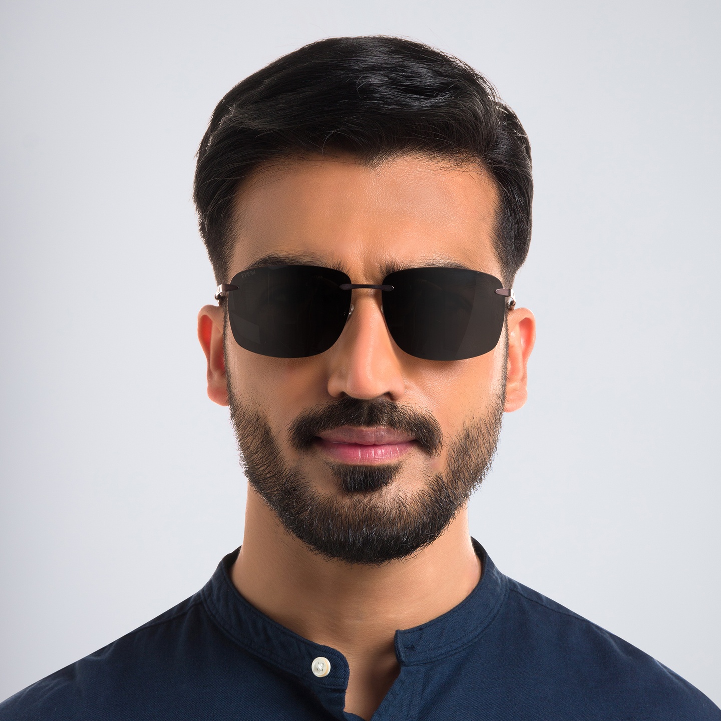 Shop EYE'M Rimless Rectangle Sunglasses in Brown online.