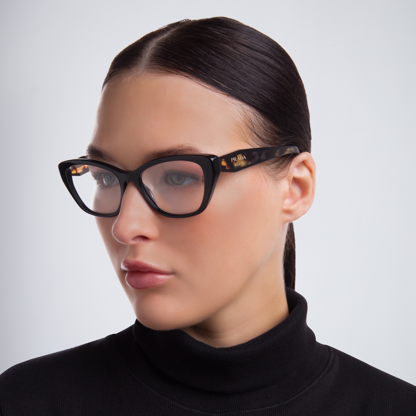 Shop PRADA Cat Eye Eyeglasses in Black online.