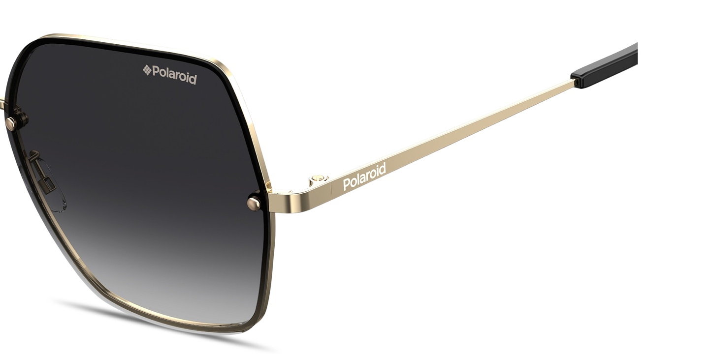 Shop Polaroid Engraved Logo Oversized Irregular Sunglasses in Gold Grey online.