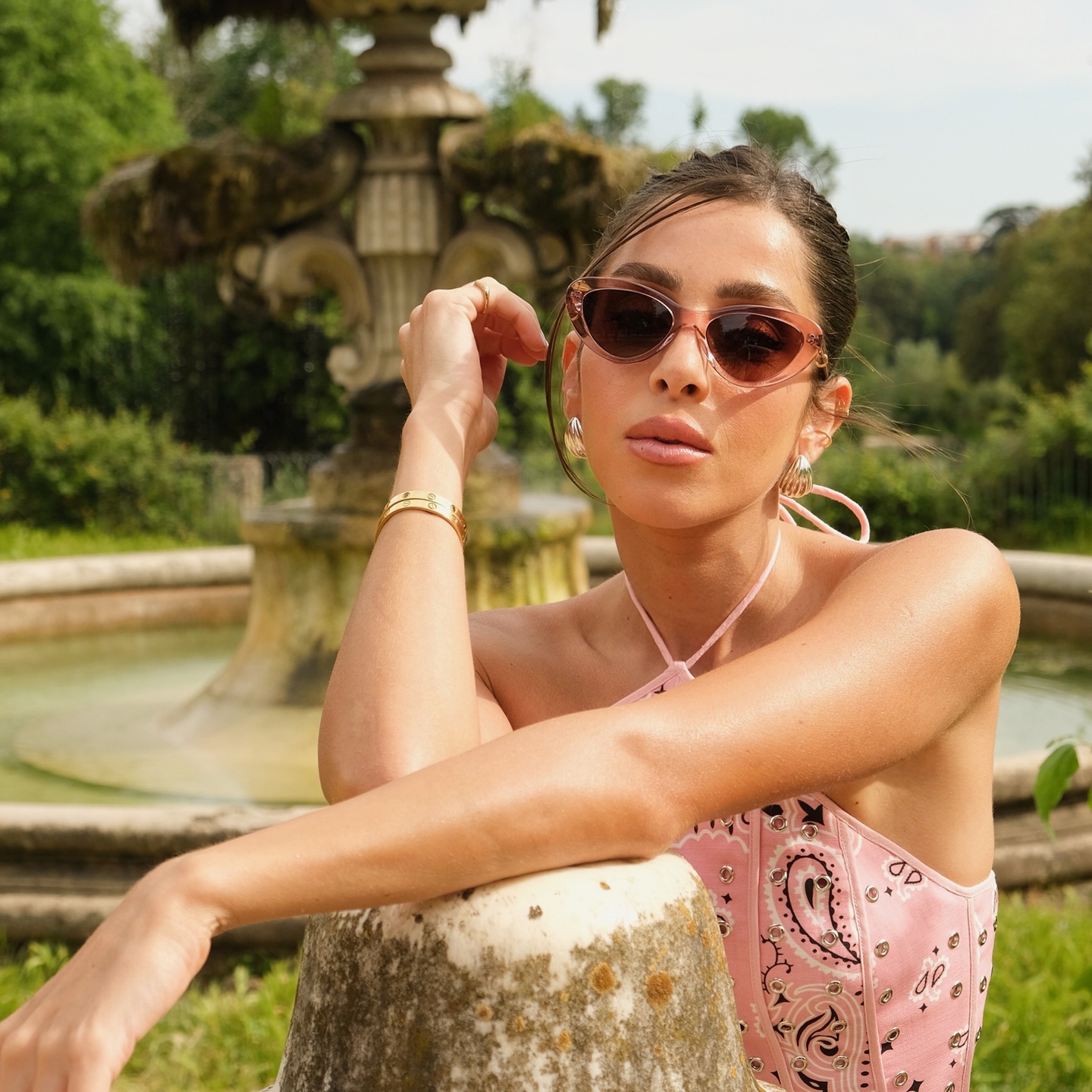 TRICE Delilah Cat-Eye Sunglasses in Transparent Nude – Model Photo 1