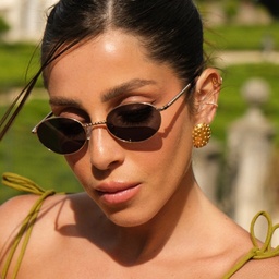 TRICE Paloma Gold Ball Oval Sunglasses in Gold – Model Photo 2