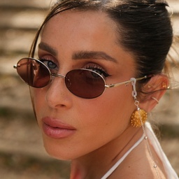 TRICE Paloma Gold Ball Oval Sunglasses in Gold – Model Photo 6