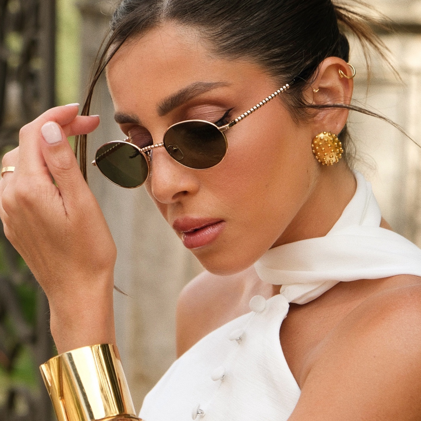TRICE Paloma Gold Ball Oval Sunglasses in Gold – Model Photo 1