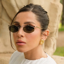 TRICE Leila Edgy Irregular Sunglasses in Gold – Model Photo 2