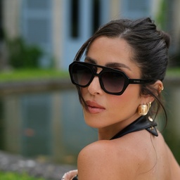 Shop TRICE Malaka Irregular Sunglasses in Black online.
