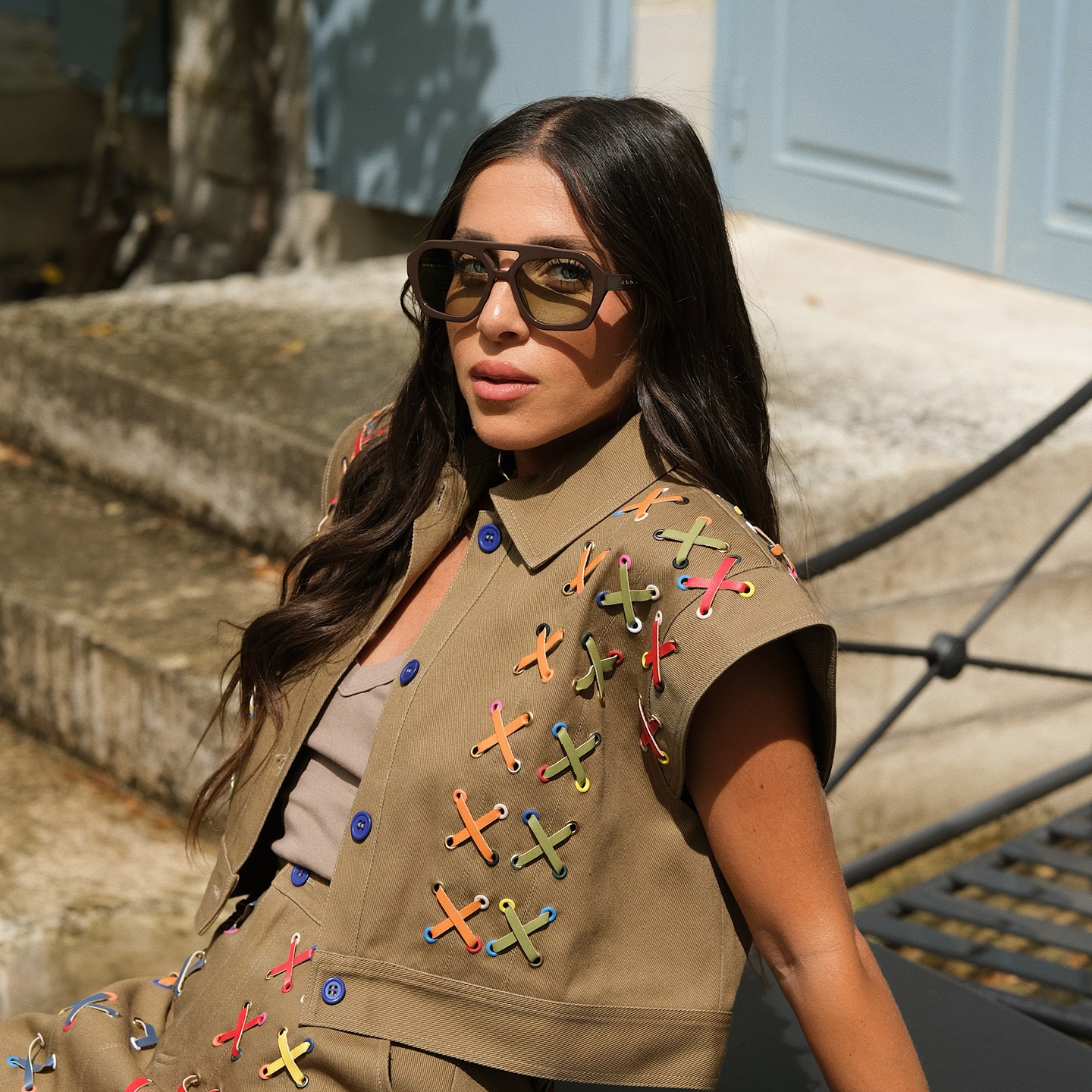 Shop TRICE Malaka Irregular Sunglasses in Brown online.